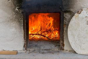 Traditional house Archangelos Rhodes.  Old wooden oven in use.